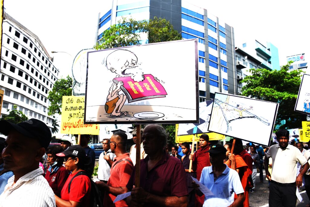 බදු ගහපිය ධනපතියන්ට _ සහන දියව් ජනතාවට !
